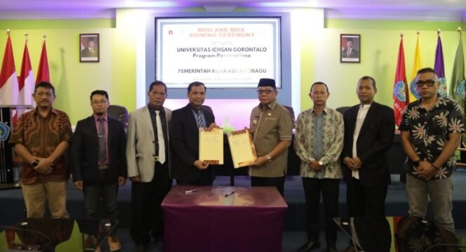 
PJ Wali Kota Kotamobagu dan Wakil Rektor 1 Universitas Ichsan Tandatangani Nota Kesepakatan Bersama