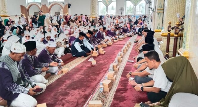 
Pemkot Kotamobagu Sambut Kepulangan 98 Jemaah Haji di Masjid Al Munawwar