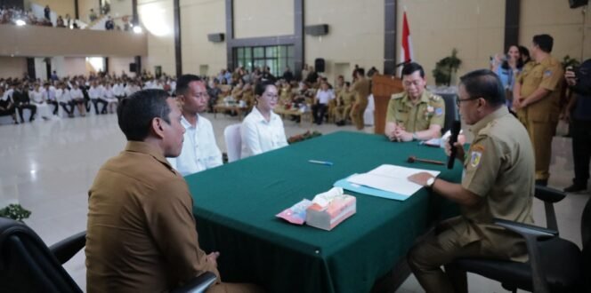 
Wali Kota Kotamobagu Menjadi Saksi Nikah Massal Dilaksanakan Pemprov Sulut