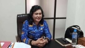 Foto - Telly Olivia Ticoalu S.Pd.M.Si Kepsek SMK Negeri 1 Manado