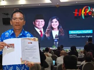 Foto : Sekretaris PWI Sulut Dr.Merson Simbolon, A.Md, SE.,MBA,M.Si menerima Press Card Number One (PCNO) pada peringatan HPN 2026 di Banten, Senin (9/2).