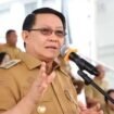 Foto - Plt Sekprov Sulut Dr Denny Mangala M.Si